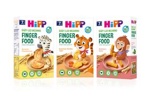 Drei Packungen HiPP Baby-Led-Weaning Finger Food mit Tierillustrationen Zebra, Tiger und Affe auf der Vorderseite