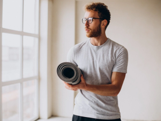 Man holding his head in hand