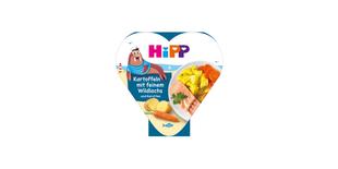 HiPP Bio Babymahlzeit „Kartoffeln mit feinem Wildlachs und Karotten“ in Herzchen-Schale mit Serviervorschlag auf der Verpackung