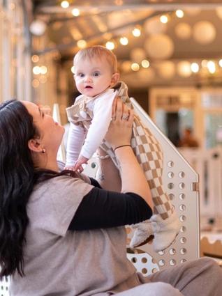 Mum playing with baby