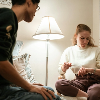A couple nervously waiting for pregnancy test results