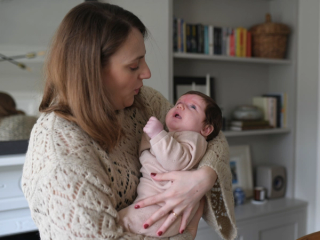 Mom soothing crying baby