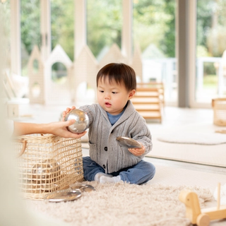 Toddler playing with toys