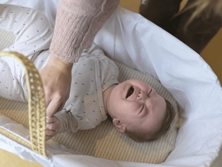 Baby upset in bassinet