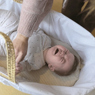 Baby upset in bassinet
