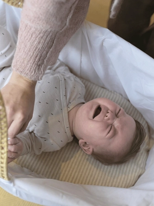 Baby upset in bassinet