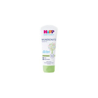 HiPP Babysanft Wundschutz Sensitiv Creme-Tube mit Bio-Mandelöl für den Windelbereich auf schwarzem Hintergrund