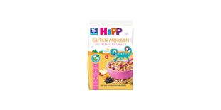 HiPP Guten Morgen Bio Frühstücks-Ringe Packung mit bunter Müslischale, Getreide und Früchten auf gelbem Hintergrund
