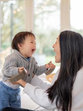 Mum and baby playing