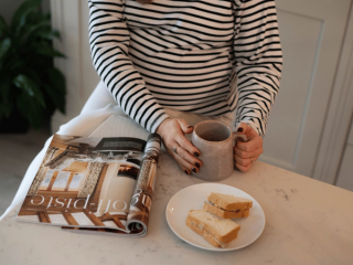 Pregnant woman eating a sandwhich