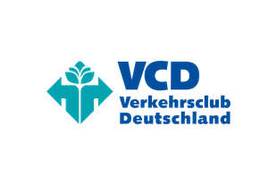 Logo des Verkehrsclub Deutschland (VCD) mit türkisfarbenem Pfeilsymbol und Blatt auf schwarzem Hintergrund