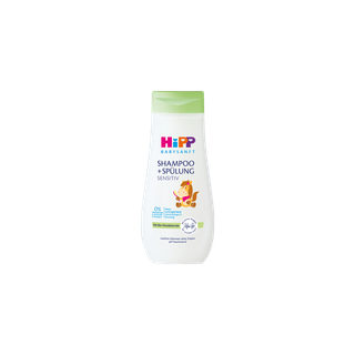 HiPP Babysanft Shampoo + Spülung Sensitiv Flasche mit grünem Deckel und Eichhörnchenmotiv auf weißem Hintergrund