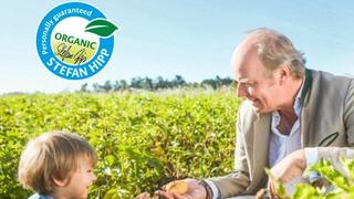 Stefan and son picking potatoes