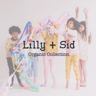 Three smiling children in colourful organic cotton outfits with the Lilly + Sid Organic Collection logo overlaid