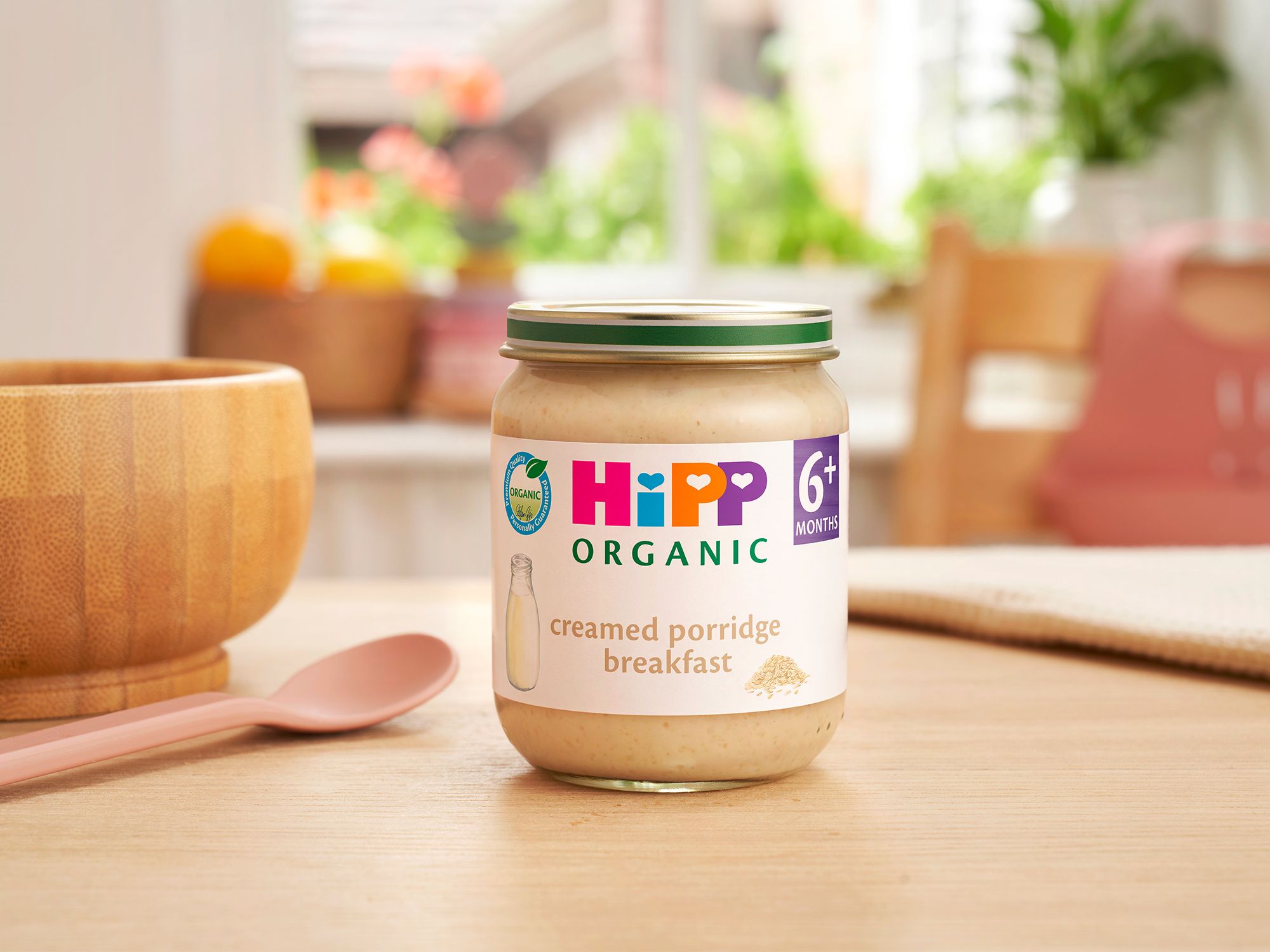 HiPP Organic Creamed Porridge Breakfast next to a breakfast bowl