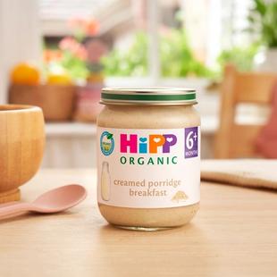 HiPP Organic Creamed Porridge Breakfast next to a breakfast bowl