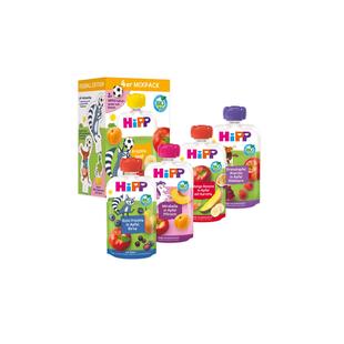 Mehrere bunte Hipp Babybrei-Quetschbeutel vor einer Verpackung mit Tierillustrationen