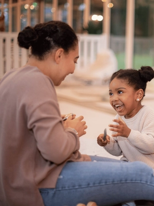 Mum and daughter playing