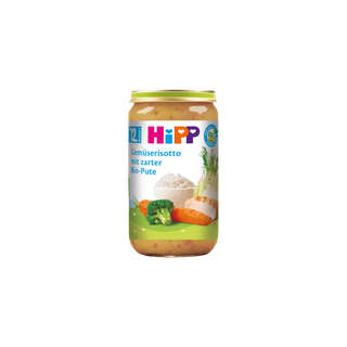 HiPP Glas Gemüserisotto mit zarter Bio-Pute 250g für Babys ab 12 Monaten auf schwarzem Hintergrund