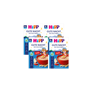 Viererpack HiPP Gute Nacht Bio Milchbrei Apfel, ab 6 Monaten, ohne Zuckerzusatz auf schwarzem Hintergrund angeordnet