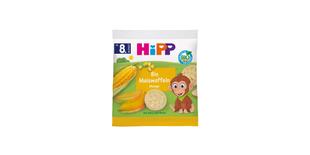 HiPP Bio Maiswaffeln Mango Snackpackung mit Maiskolben, Mangostücken, Waffeln und fröhlichem Affenmotiv ab 8. Monat