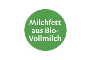 Grüner Kreis mit weißer Schrift 'Milchfett aus Bio-Vollmilch'