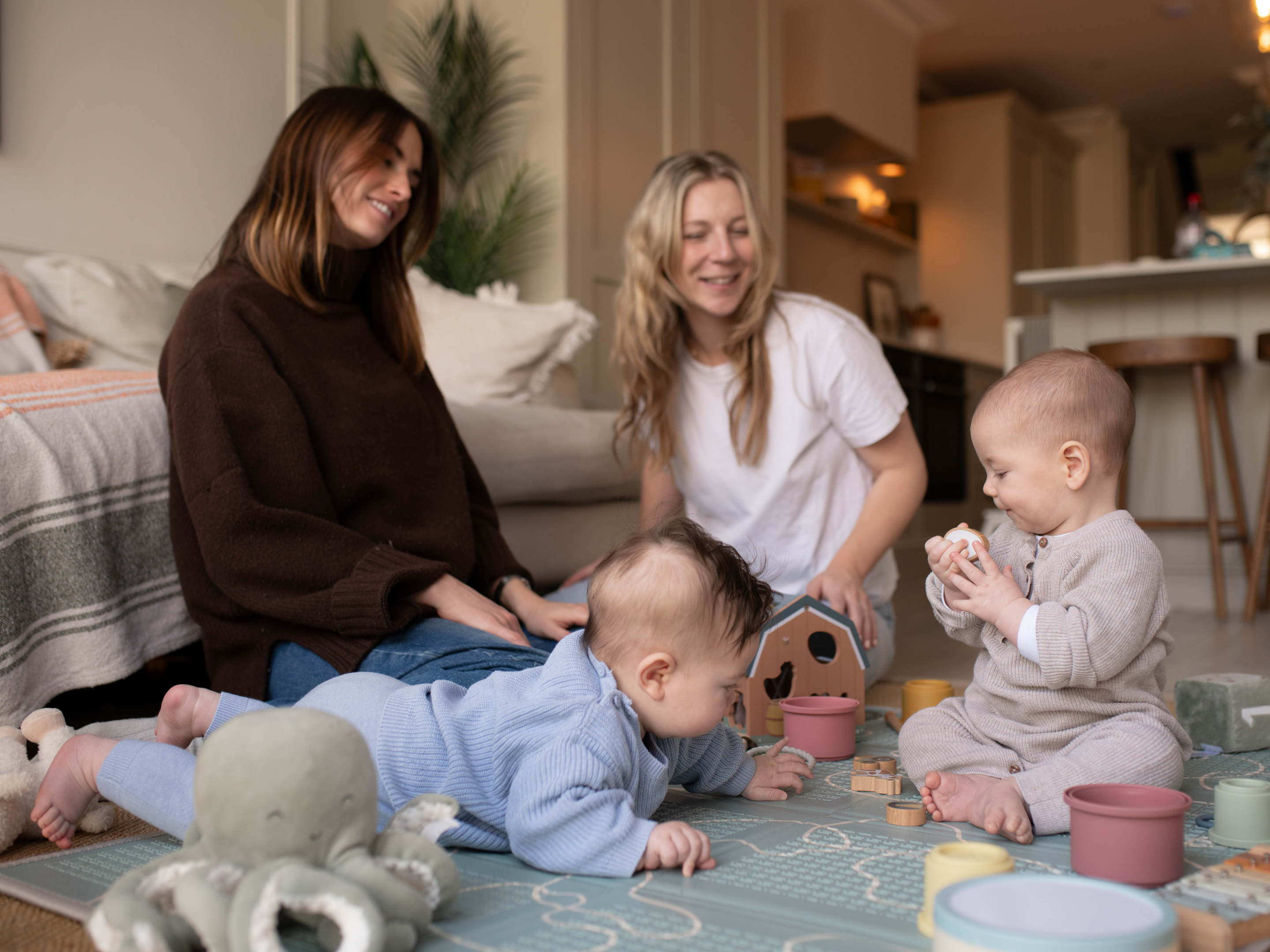 Two mums on a playdate with their babies
