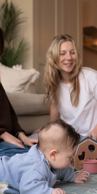 Two mums on a playdate with their babies