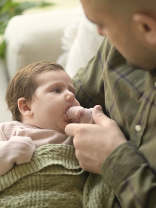 Dad with newborn baby