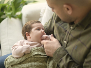 Dad with newborn baby