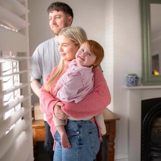 Family looking out a window
