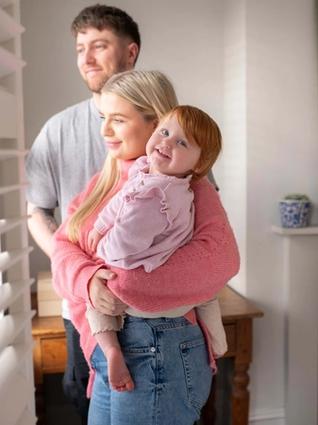 Family looking out a window