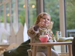 Toddler eating snacks