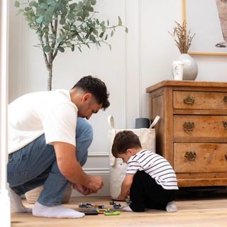 Dad and son playing with Lego together
