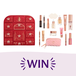 A Charlotte Tilbury beauty advent calendar in crimson red with gold details, displayed next to various makeup and skincare products and a pink quilted pouch, above large purple text that reads "WIN".