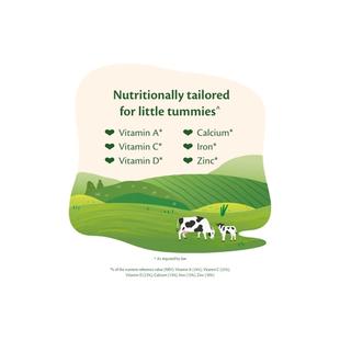 HiPP Organic growing up milk graphic showing key toddler nutrients above a green countryside scene with cows grazing