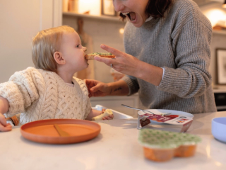 Mum feeding baby