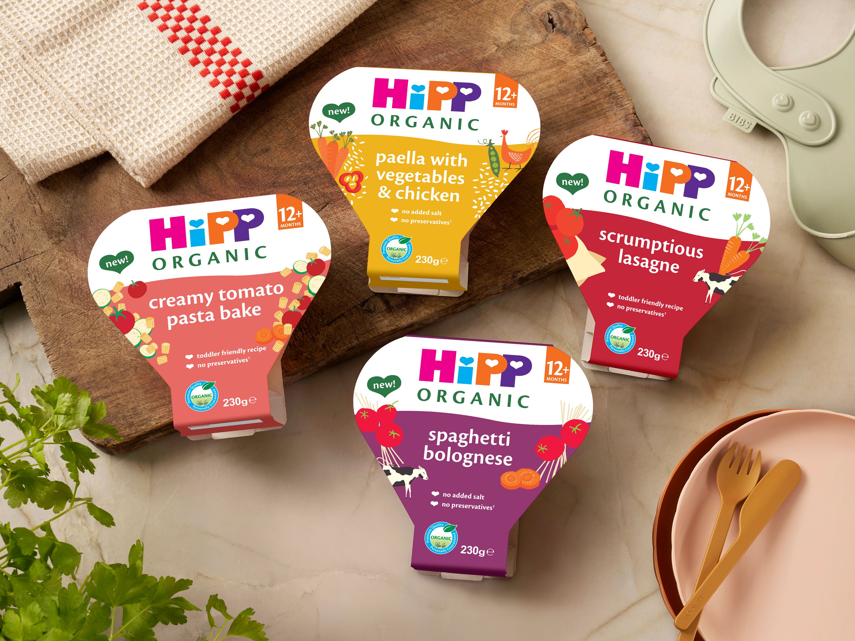 Four HiPP Organic toddler meals: Creamy tomato pasta bake, Paella with vegetables & chicken, Scrumptious lasagne and spaghetti bolognese.