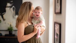 Mum holding baby in her arms