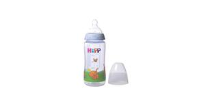 Kunststoff-Babyfläschchen mit HiPPofanten-Tiermotiv und Messskala, daneben abgenommene transparente Schutzkappe