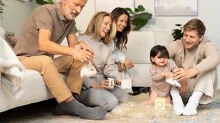 A family sat together in a living room