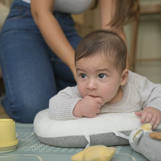 Baby chewing on his fingers