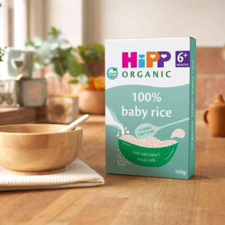 HiPP Organic 100% Baby Rice on kitchen worktop next to cereal bowl