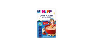 HiPP Gute Nacht Bio Milchbrei Apfel Packung mit roter Schale Brei, Apfelstücken und Getreideähren auf blauem Hintergrund