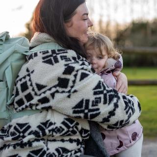 Mum hugging her toddler