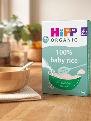 HiPP Organic 100% Baby Rice on kitchen worktop next to cereal bowl