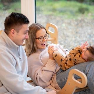 New parents spending time with baby