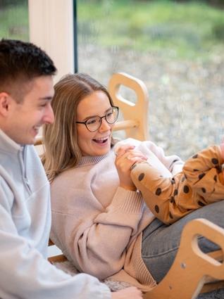 New parents spending time with baby