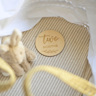 Bassinet with milestone card and soft toy