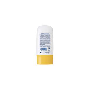 Rückseite einer weißen Plastikflasche mit gelbem Verschluss und kleinem Textblock